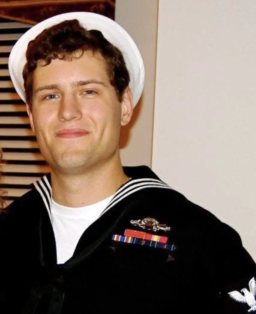 A young Sam Deering in his U.S. Navy dress uniform